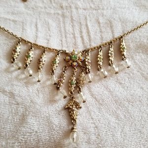 1928 gold tone 18" necklace with clear & color gem